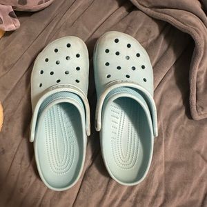 teal woman’s crocs